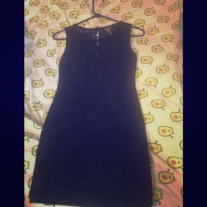 Black mini dress with floral sheer pattern